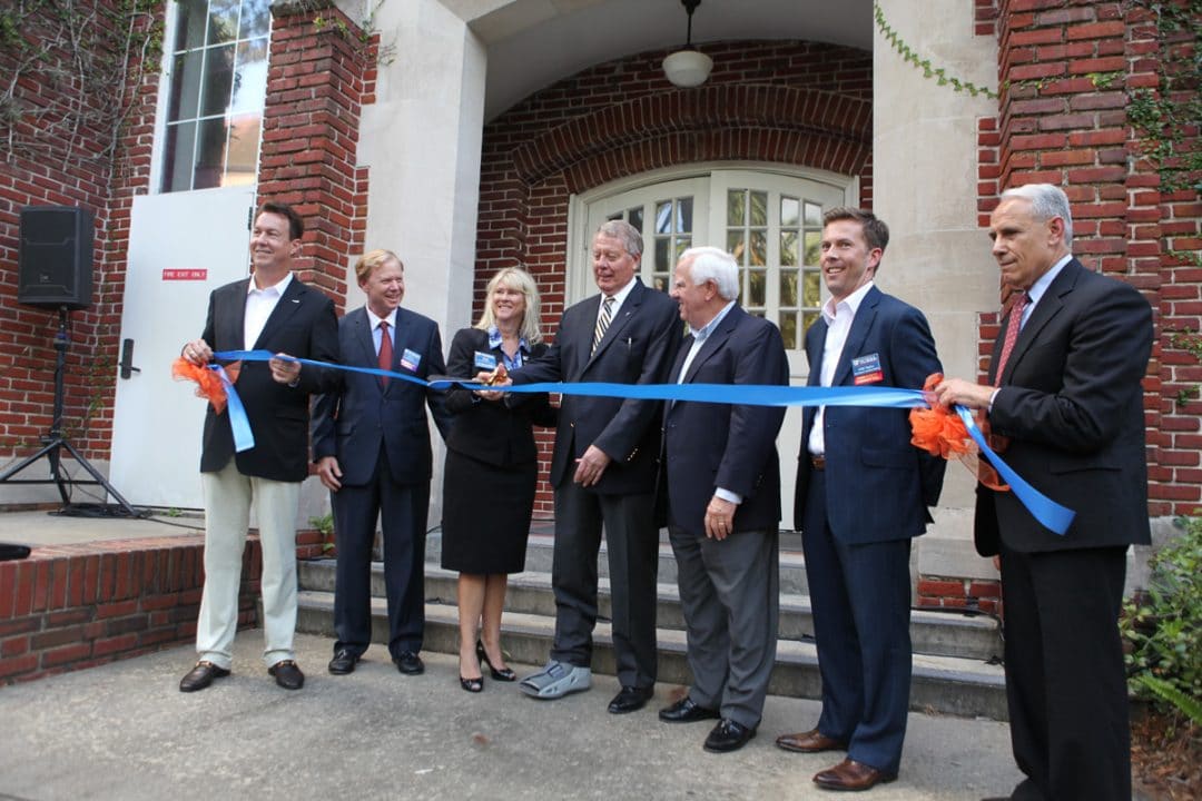 Kelley A. Bergstrom cuts the ribbon celebrating renovated Bergstrom Center for Real Estate Studies