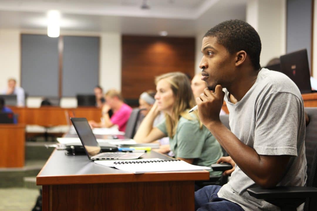 Students in Hough Graduate School of Business classroom