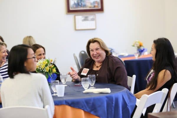 Barbara Jean Raskin (center) speaks with students at the 11th Annual Women in Accounting Symposium.