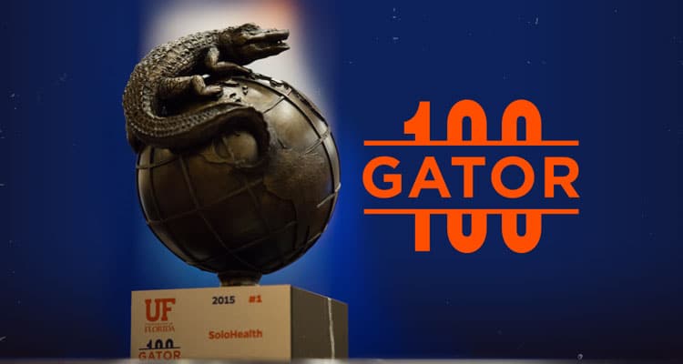 Gator 100 trophy next to the Gator 100 logo