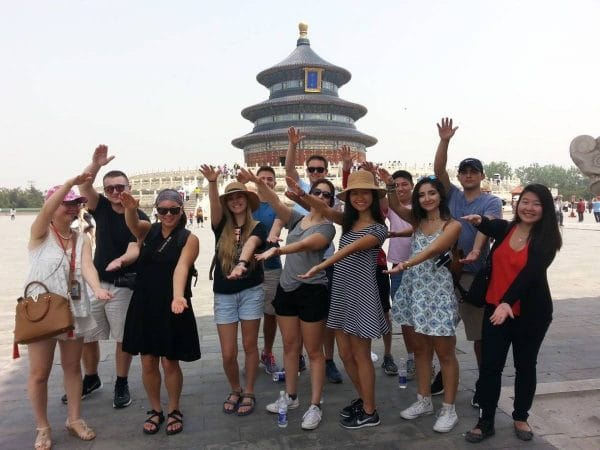 Group of UF students doing the Gator Chomp in China