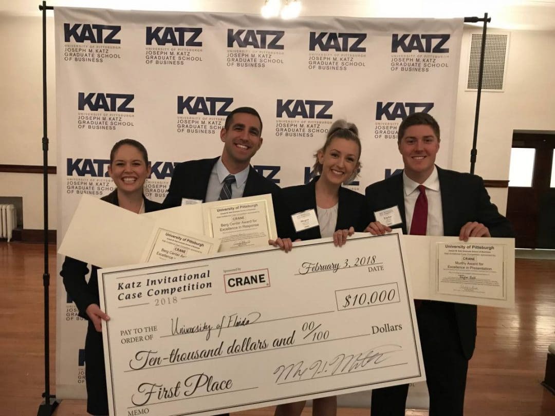 Katz Invitational Case Competition 2018 winners hold a check for $10,000