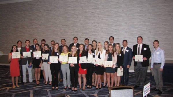 Fisher School students pose for a photo at an award banquet