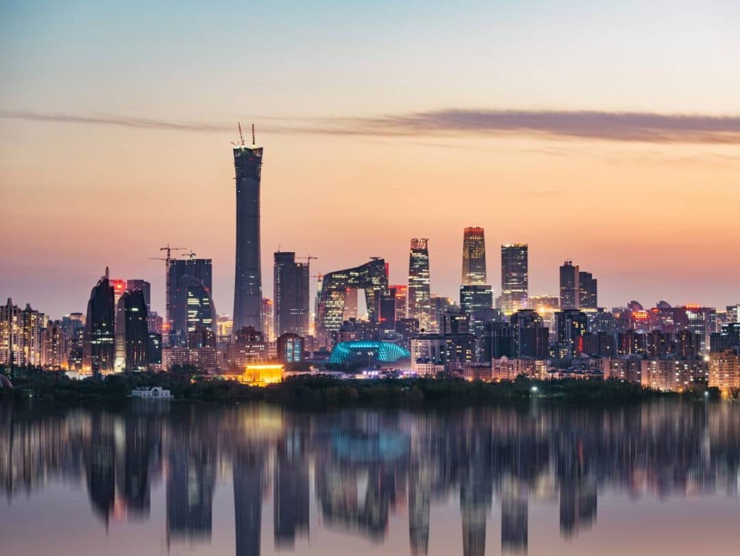 Beijing skyline with large skyscrapers overlooking a river