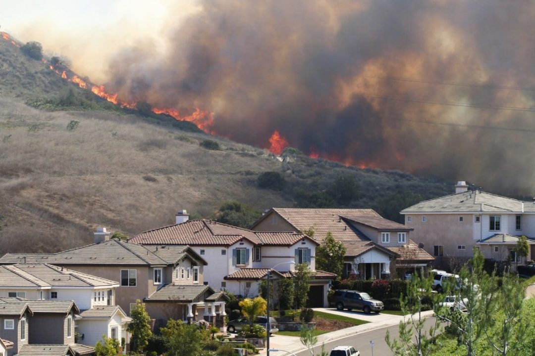 Image of fire very close to homes in California.