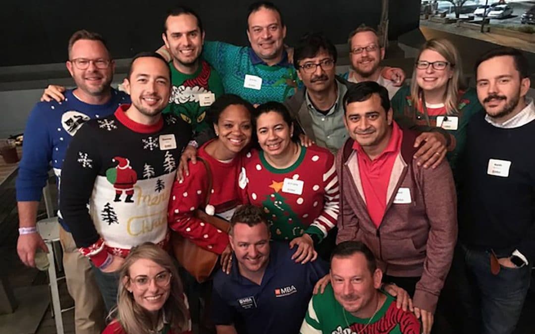 Group of UF MBA students wearing Christmas Sweaters