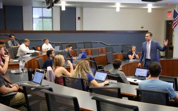 Professor Anthony Coman teaches a course in management communications to a small group of UF MBA Full-Time students