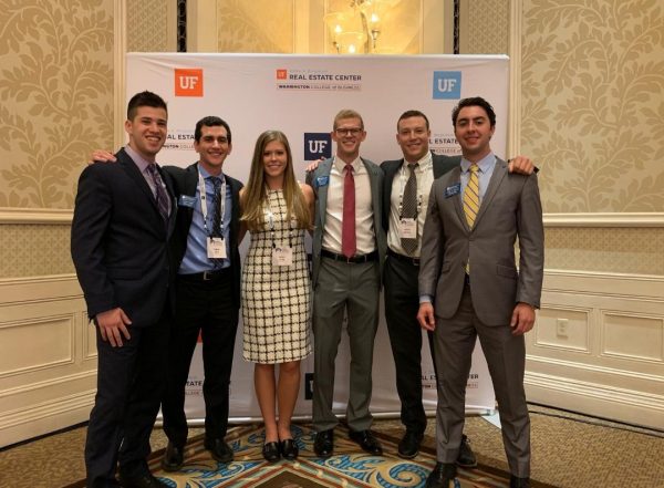 Mike Harris, fourth from left, with fellow MSRE students at the 2019 Trends Conference in Orlando, Florida.