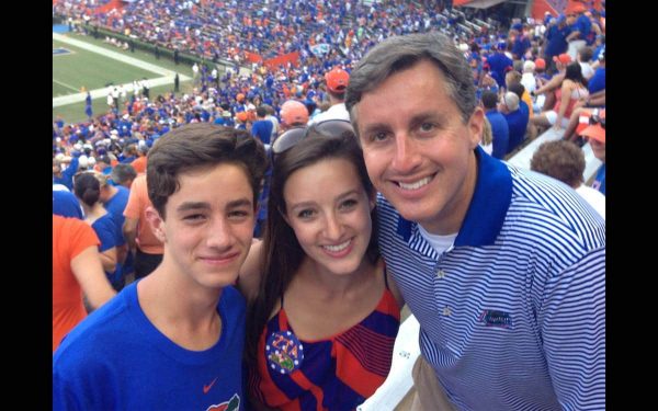 Bruce Brandes and his daughter and son at a GatorFootball game