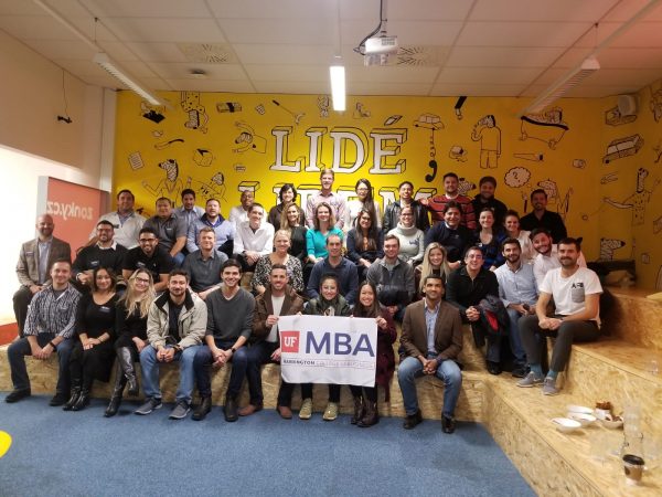 Large group of UF MBA students in the Zonky office in Prague