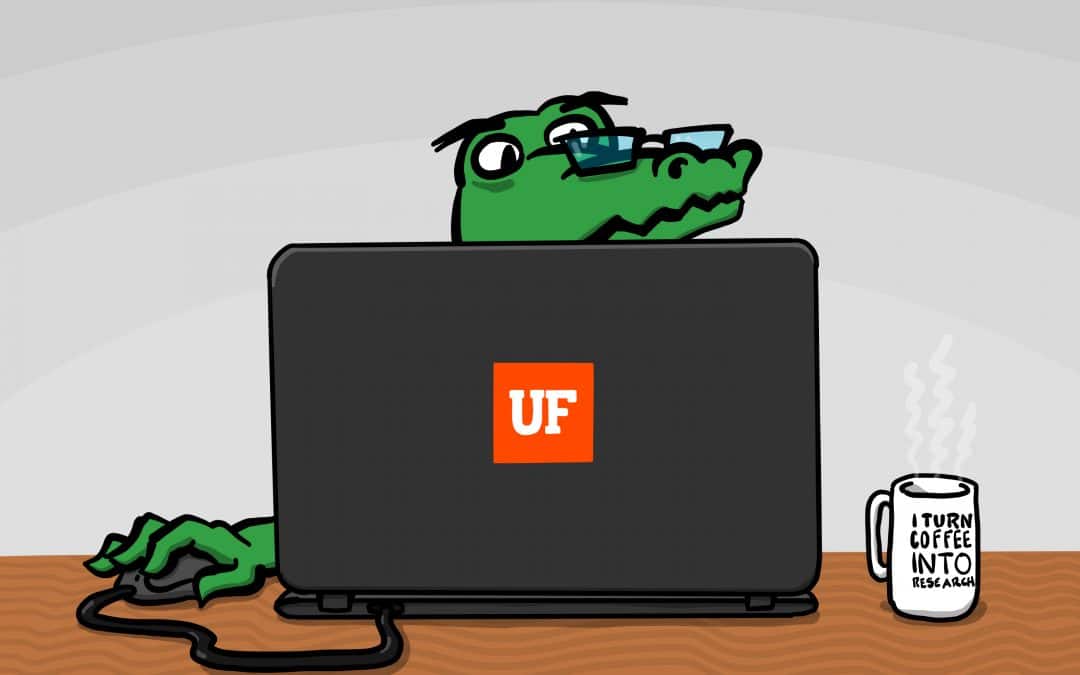 Cartoon alligator sitting at a computer. He wears glasses and is using a mouse to navigate on the computer. He has a UF logo sticker on his computer and a coffee mug next to his computer that reads I turn coffee into research.