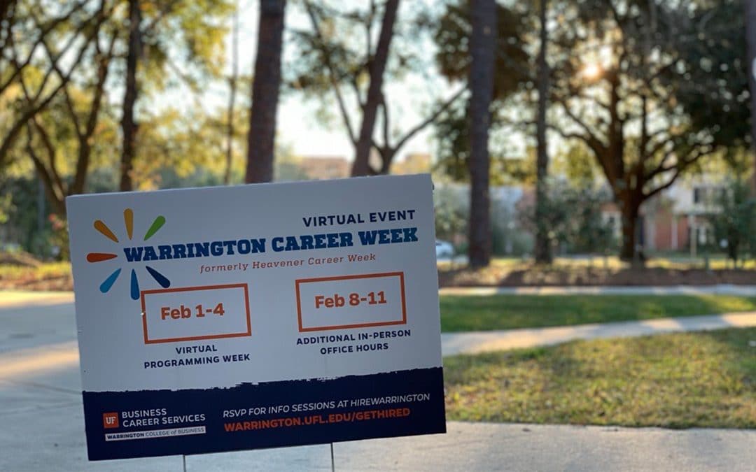 Yard sign advertising Warrington Career Week with its dates and how to access the event online with a background of the Warrington campus.