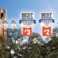 Three small badges and two large badges across an image of a large tower and trees. Large badges read Best Online Programs US News & World Report MBA Programs 2022 #3 and Bachelor's Business 2022 #2
