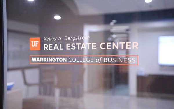 Text decal on a glass door that reads Kelley A Bergstrom Real Estate Center Warrington College of Business.