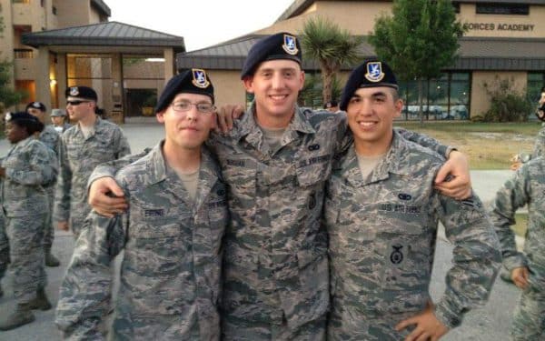 Alexander Reneau poses for a photo with two other male Air Force members