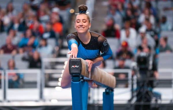 Leah Clapper competes at a gymnastics competition.