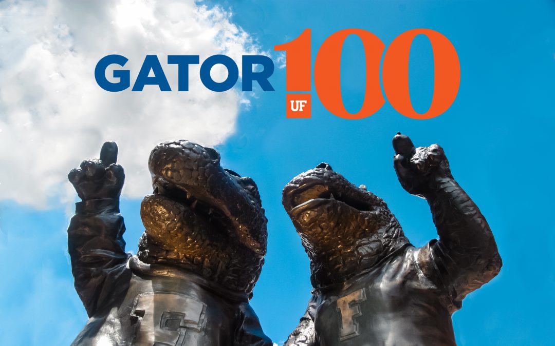 Gator100 logo above a bronze statue of UF mascots Albert and Alberta.