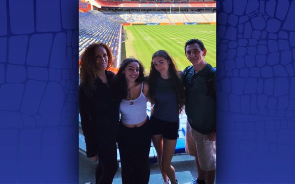 Prida family poses in the Ben Hill Griffin Football Stadium.