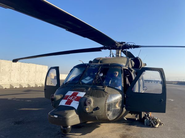 Lindsay Collins in a military helicopter.