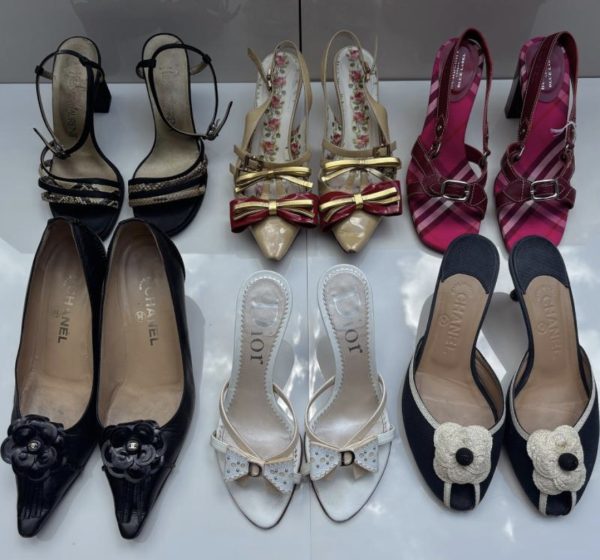 A collection of luxury brand shoes.