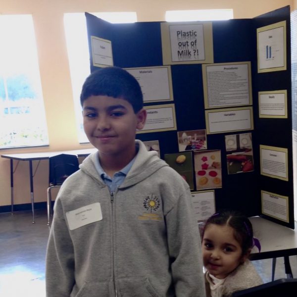 ignition packaging founder Abdurrahman Bejjaj at elementary science fair with his project