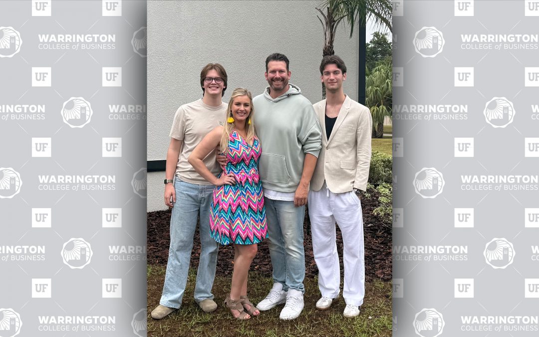 online mba student chris taylor with his wife and two children