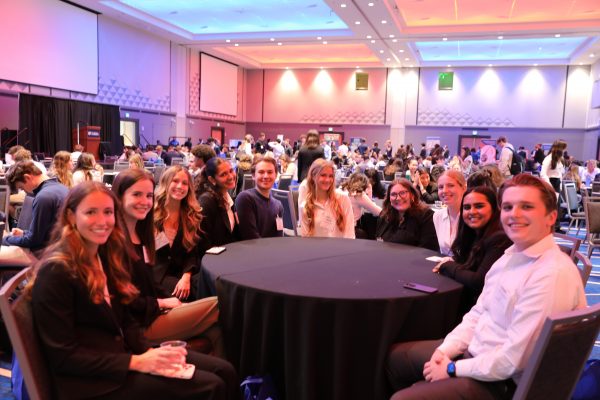 warrington welcome professional summit event with students sitting around a table