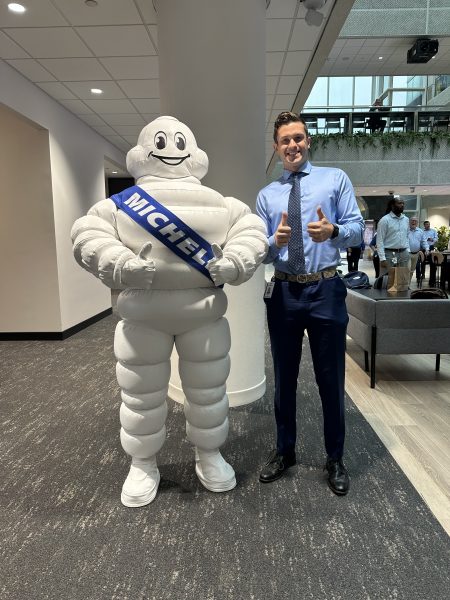 Carson Neil with Michelin Mascot with his thumbs up
