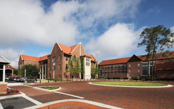 Hough and Gerson Halls. Large brick buildings in the background.