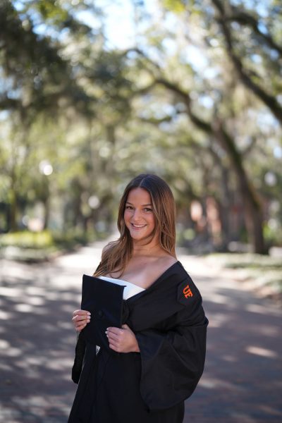 grace graduation photo with cap and gown